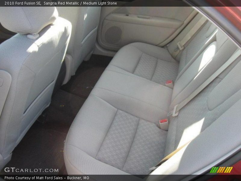 Sangria Red Metallic / Medium Light Stone 2010 Ford Fusion SE