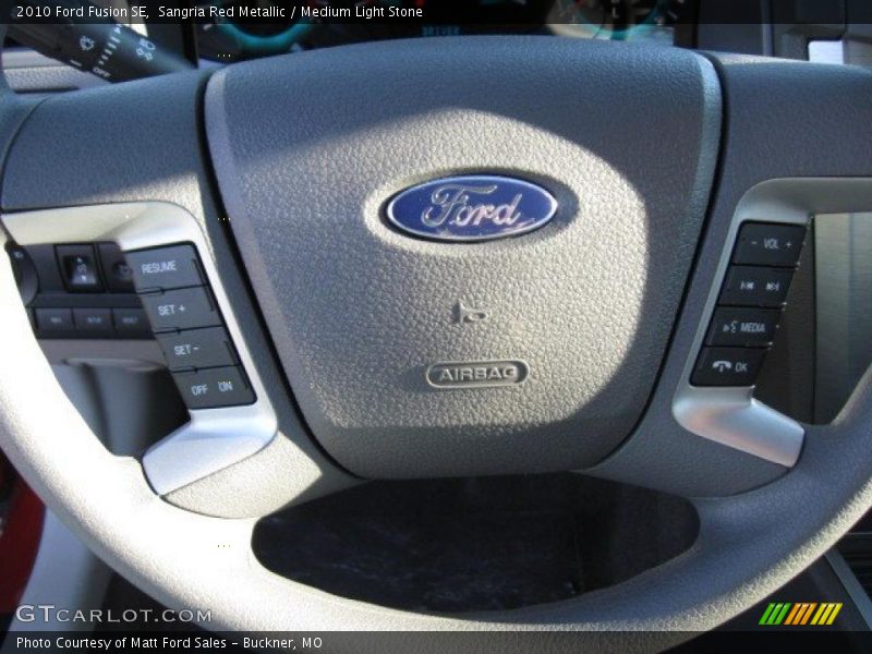 Sangria Red Metallic / Medium Light Stone 2010 Ford Fusion SE