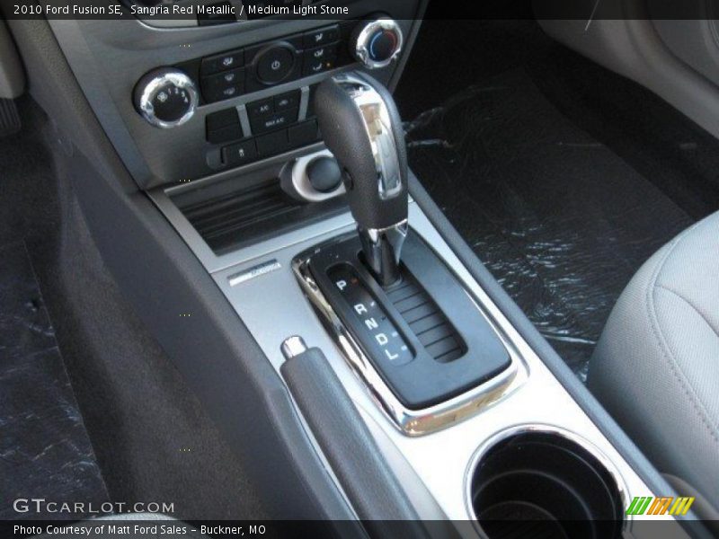 Sangria Red Metallic / Medium Light Stone 2010 Ford Fusion SE