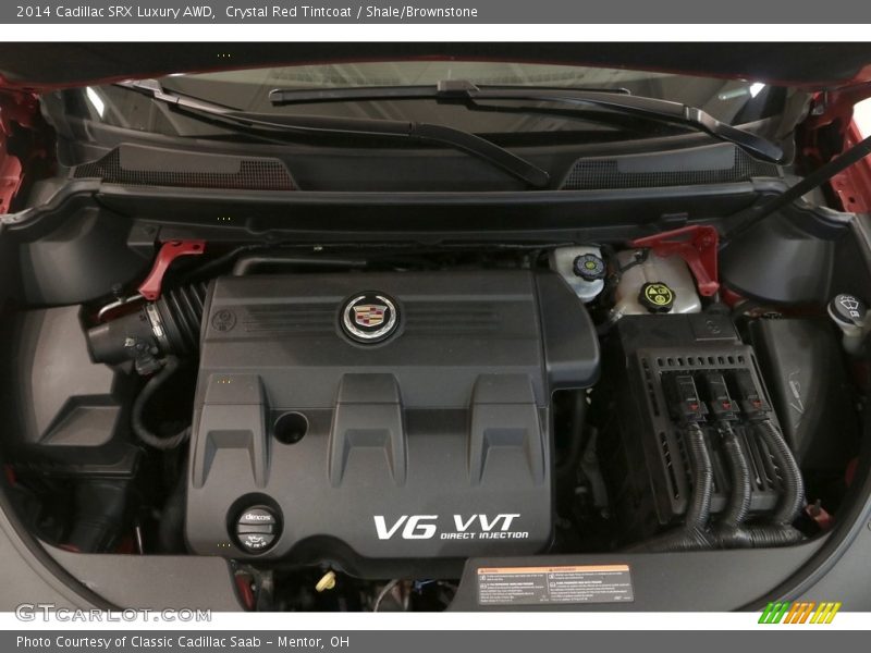 Crystal Red Tintcoat / Shale/Brownstone 2014 Cadillac SRX Luxury AWD