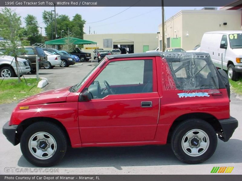 Wildfire Red / Charcoal 1996 Geo Tracker Soft Top