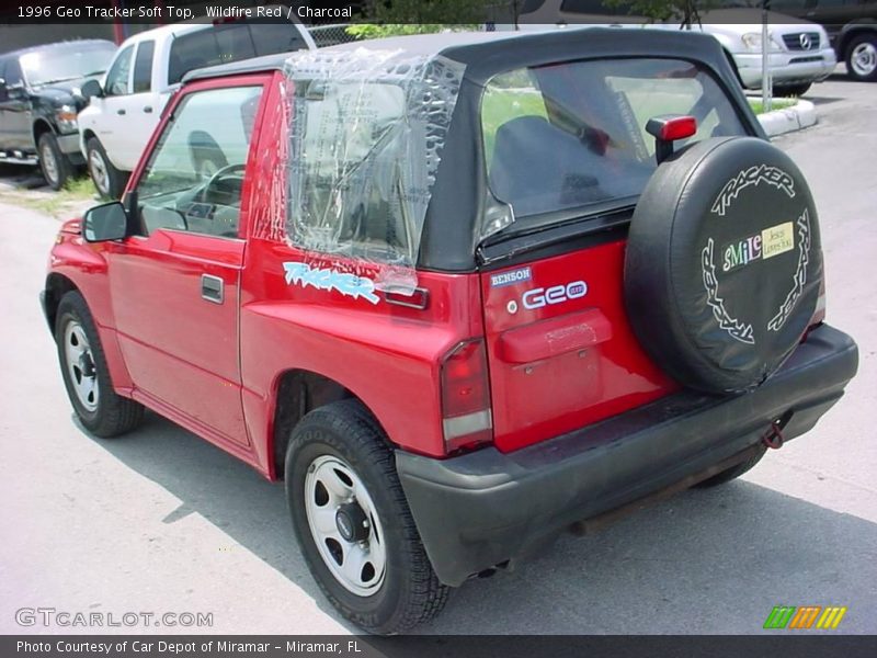 Wildfire Red / Charcoal 1996 Geo Tracker Soft Top