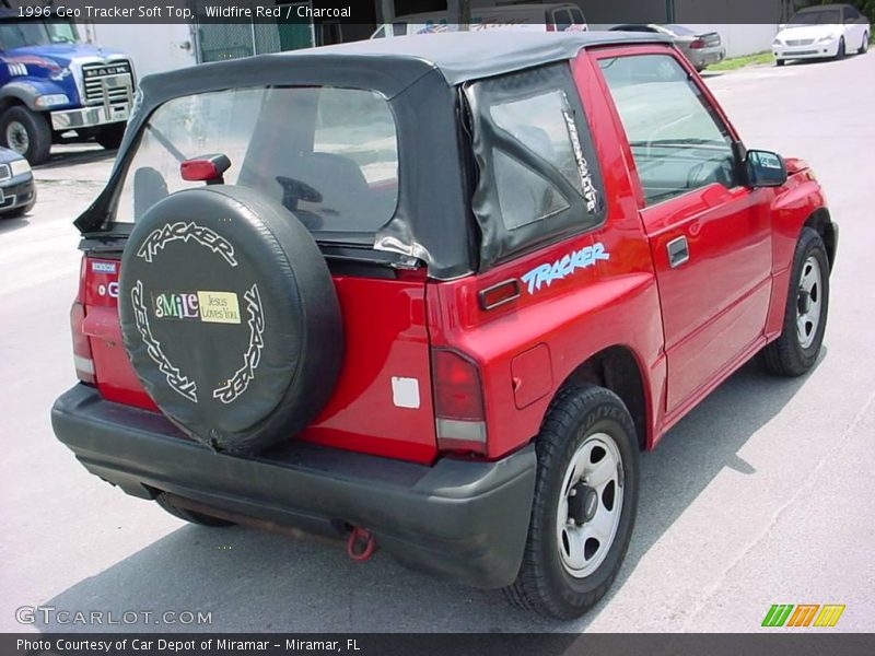 Wildfire Red / Charcoal 1996 Geo Tracker Soft Top