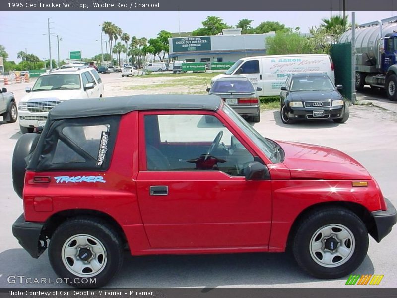 Wildfire Red / Charcoal 1996 Geo Tracker Soft Top