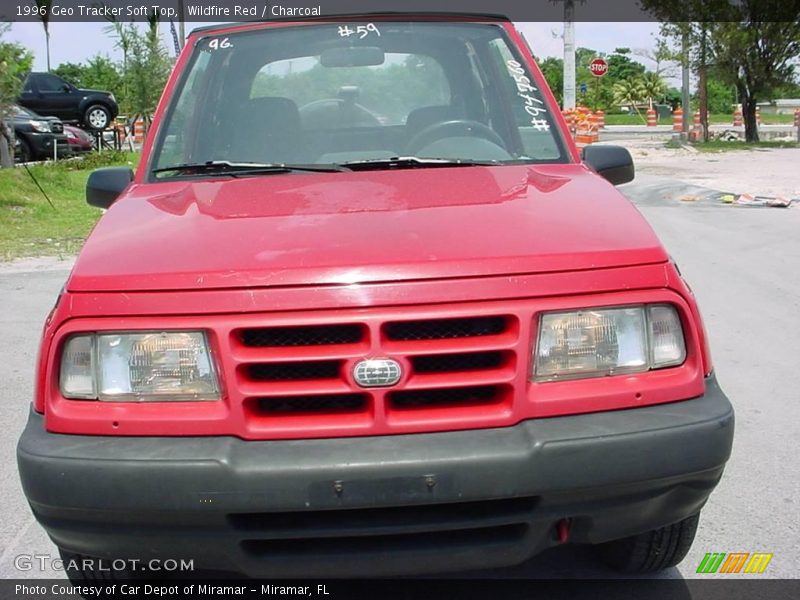 Wildfire Red / Charcoal 1996 Geo Tracker Soft Top