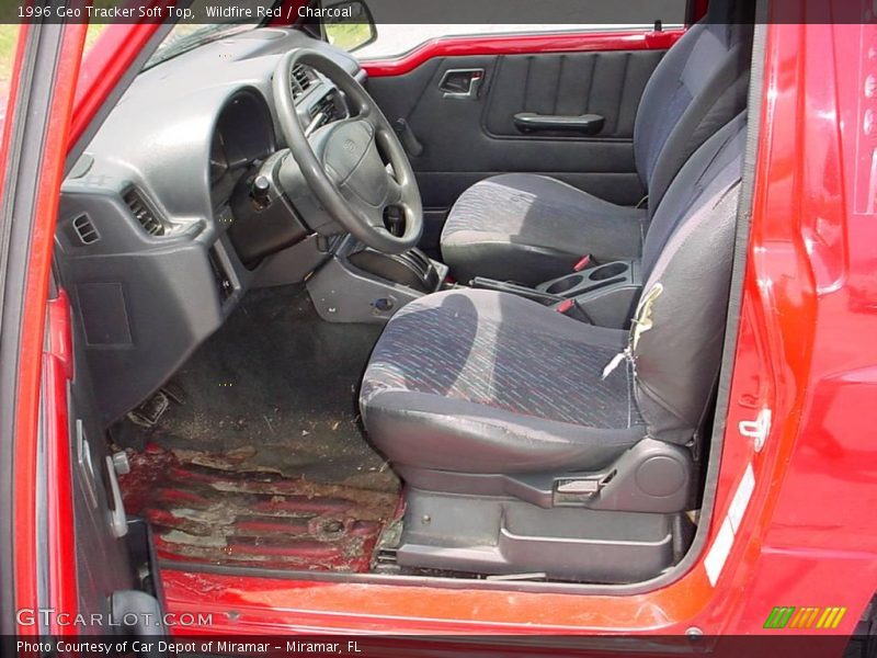 Wildfire Red / Charcoal 1996 Geo Tracker Soft Top