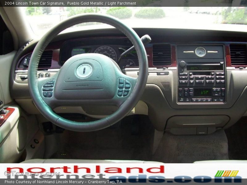 Pueblo Gold Metallic / Light Parchment 2004 Lincoln Town Car Signature