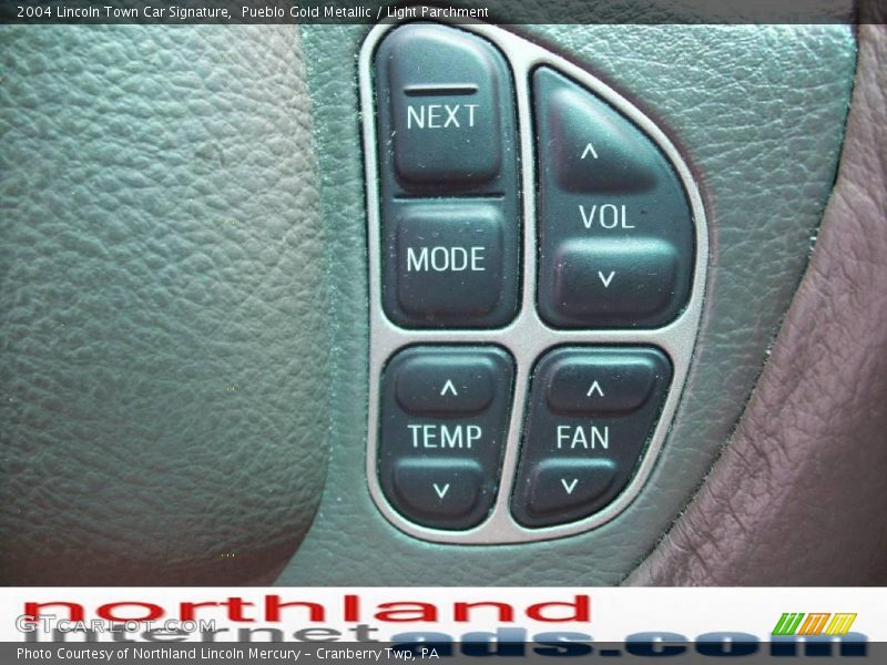 Pueblo Gold Metallic / Light Parchment 2004 Lincoln Town Car Signature