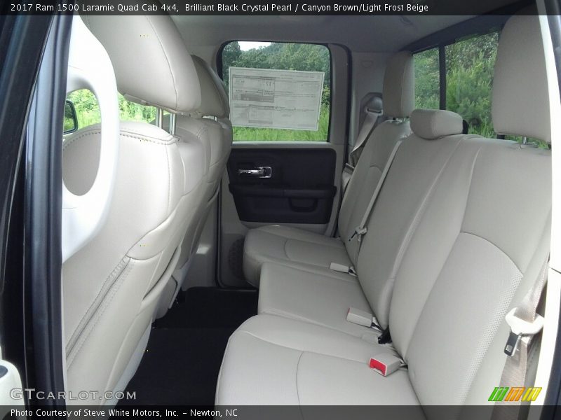 Brilliant Black Crystal Pearl / Canyon Brown/Light Frost Beige 2017 Ram 1500 Laramie Quad Cab 4x4