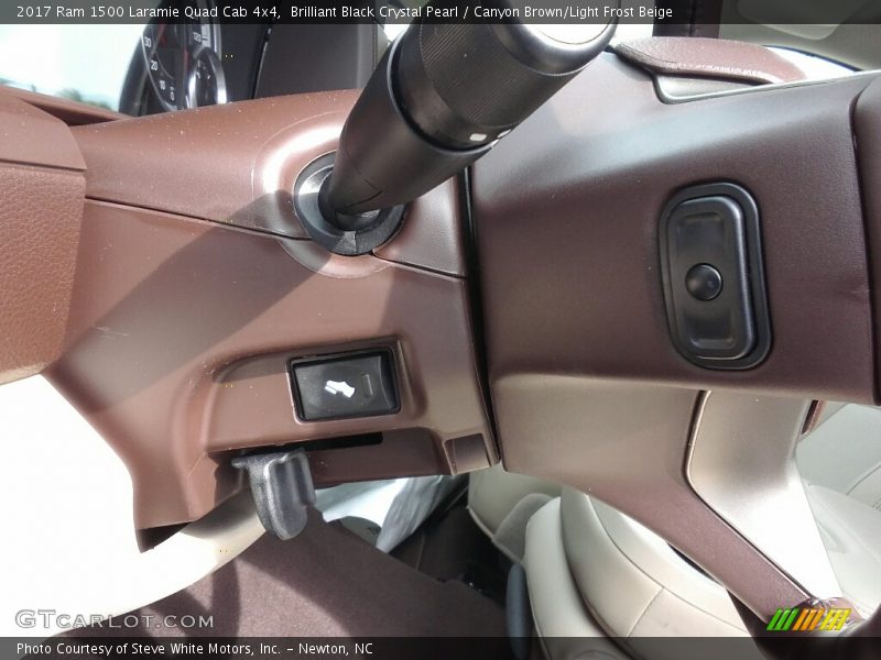Brilliant Black Crystal Pearl / Canyon Brown/Light Frost Beige 2017 Ram 1500 Laramie Quad Cab 4x4