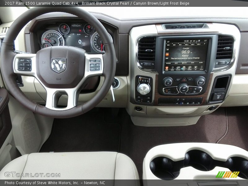 Brilliant Black Crystal Pearl / Canyon Brown/Light Frost Beige 2017 Ram 1500 Laramie Quad Cab 4x4