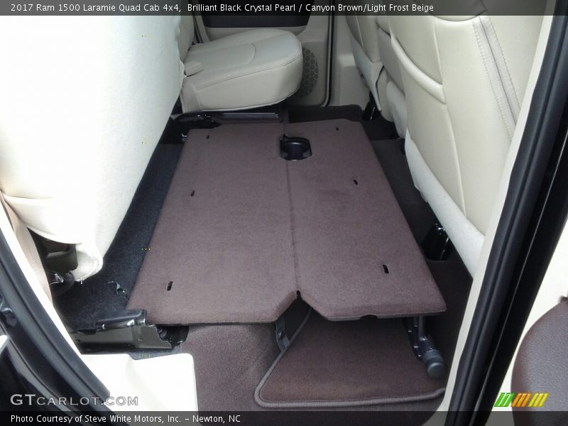 Brilliant Black Crystal Pearl / Canyon Brown/Light Frost Beige 2017 Ram 1500 Laramie Quad Cab 4x4