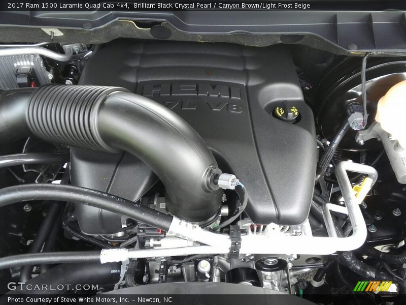Brilliant Black Crystal Pearl / Canyon Brown/Light Frost Beige 2017 Ram 1500 Laramie Quad Cab 4x4
