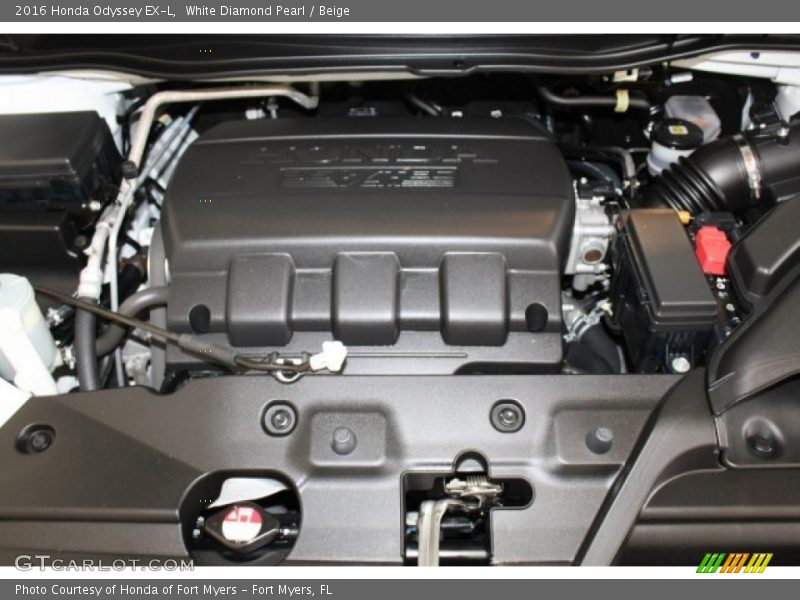 White Diamond Pearl / Beige 2016 Honda Odyssey EX-L