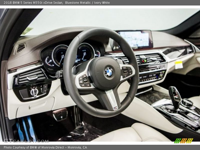 Bluestone Metallic / Ivory White 2018 BMW 5 Series M550i xDrive Sedan