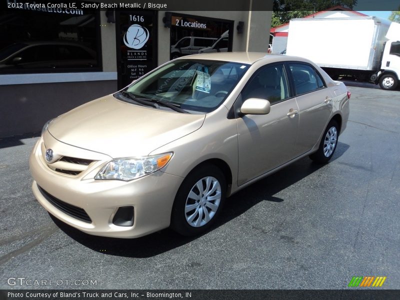 Sandy Beach Metallic / Bisque 2012 Toyota Corolla LE