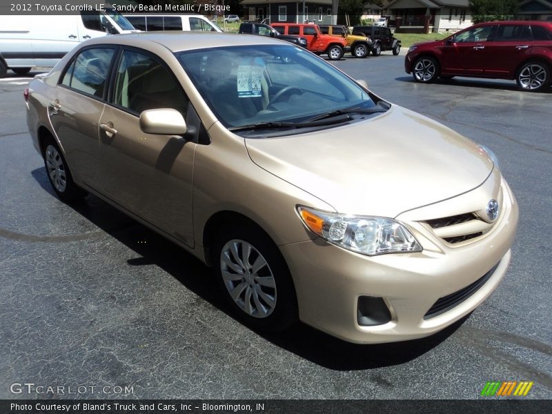 Sandy Beach Metallic / Bisque 2012 Toyota Corolla LE