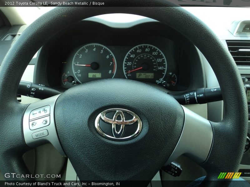 Sandy Beach Metallic / Bisque 2012 Toyota Corolla LE