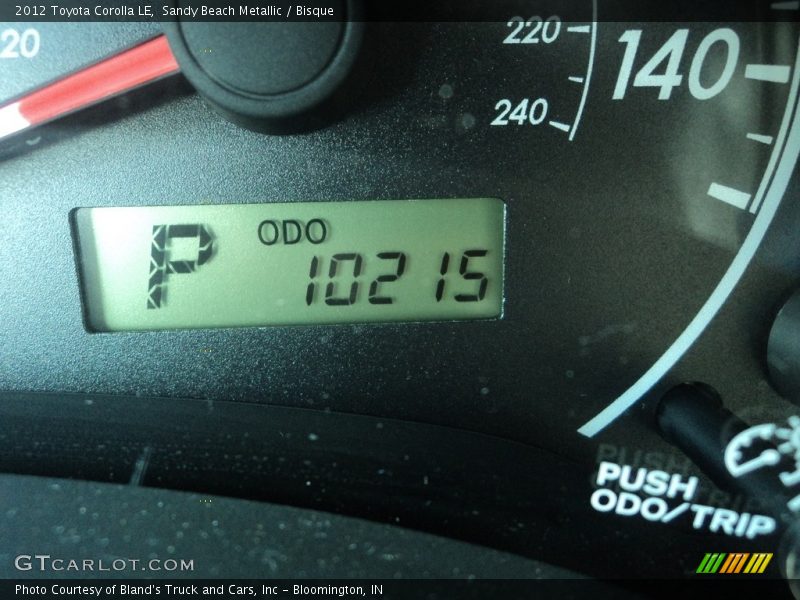 Sandy Beach Metallic / Bisque 2012 Toyota Corolla LE