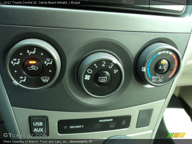 Sandy Beach Metallic / Bisque 2012 Toyota Corolla LE