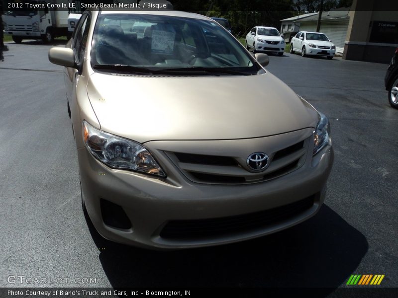 Sandy Beach Metallic / Bisque 2012 Toyota Corolla LE