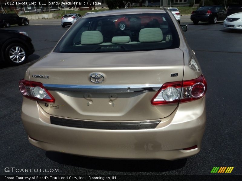 Sandy Beach Metallic / Bisque 2012 Toyota Corolla LE