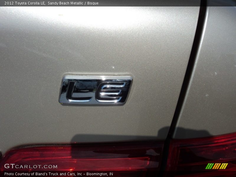 Sandy Beach Metallic / Bisque 2012 Toyota Corolla LE