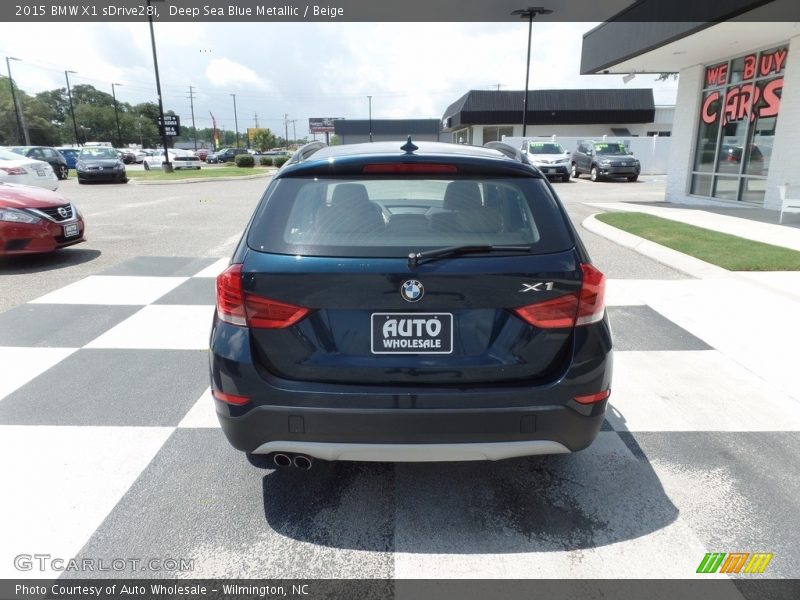 Deep Sea Blue Metallic / Beige 2015 BMW X1 sDrive28i