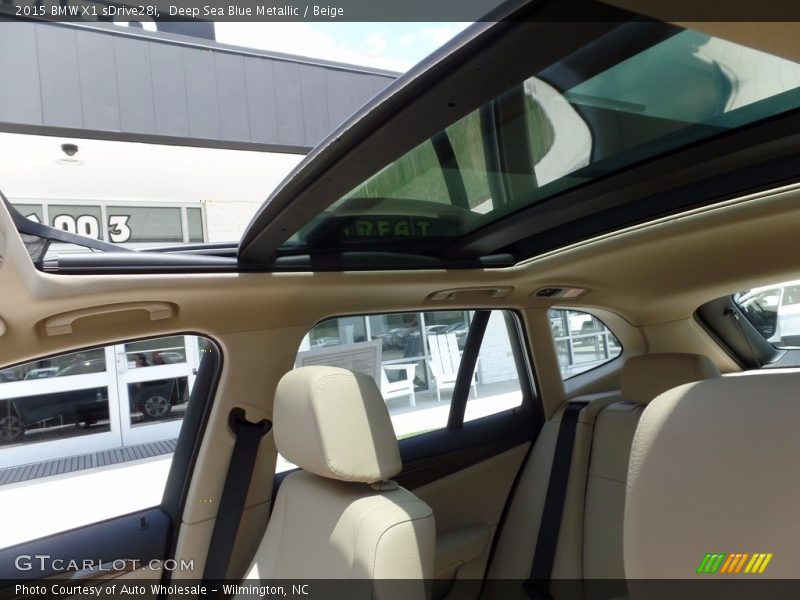Deep Sea Blue Metallic / Beige 2015 BMW X1 sDrive28i