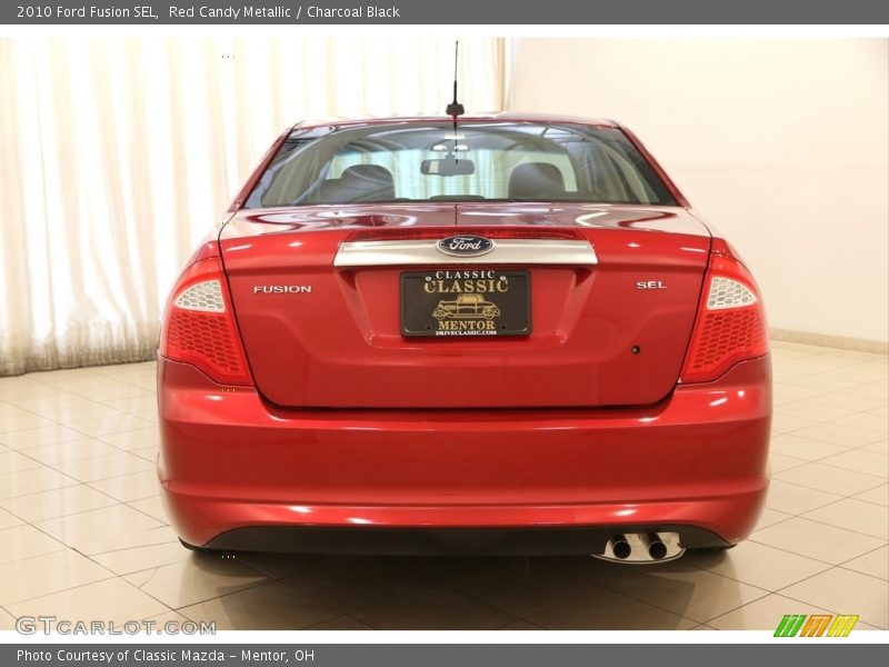 Red Candy Metallic / Charcoal Black 2010 Ford Fusion SEL