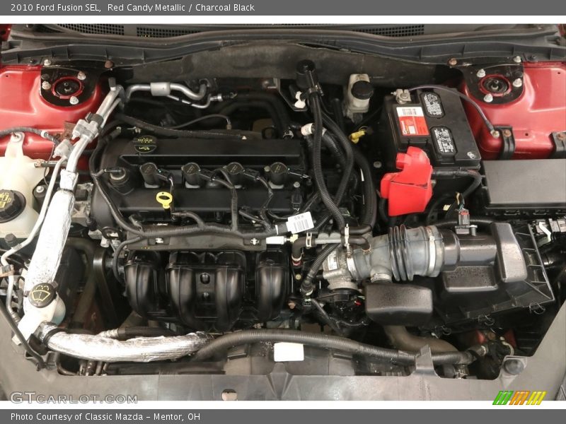 Red Candy Metallic / Charcoal Black 2010 Ford Fusion SEL