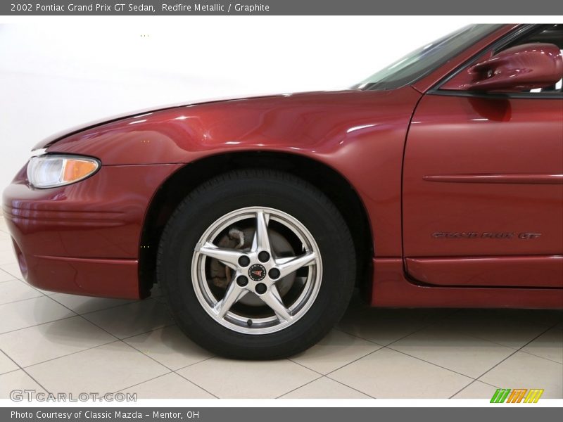 Redfire Metallic / Graphite 2002 Pontiac Grand Prix GT Sedan