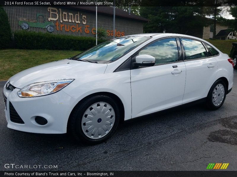 Oxford White / Medium Light Stone 2014 Ford Focus SE Sedan