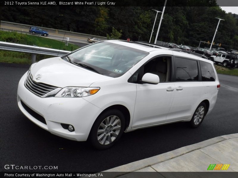 Blizzard White Pearl / Light Gray 2012 Toyota Sienna XLE AWD