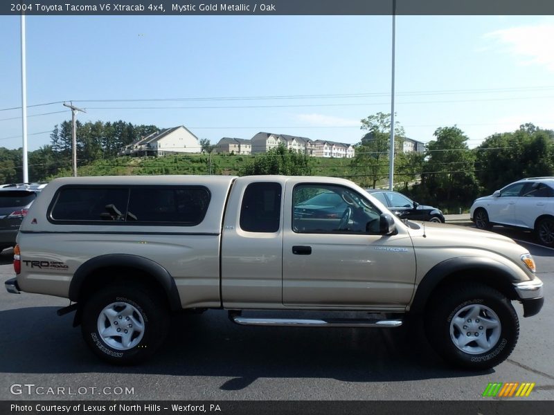 Mystic Gold Metallic / Oak 2004 Toyota Tacoma V6 Xtracab 4x4