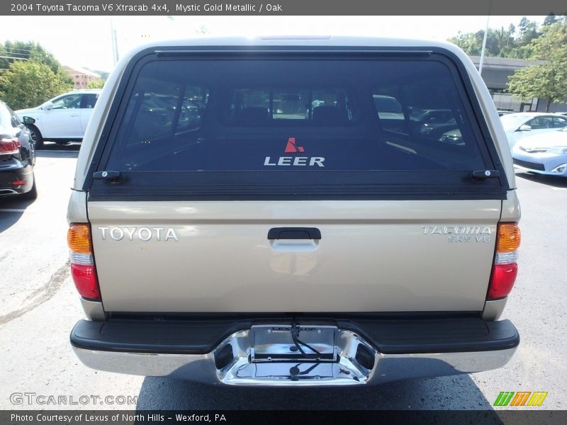 Mystic Gold Metallic / Oak 2004 Toyota Tacoma V6 Xtracab 4x4