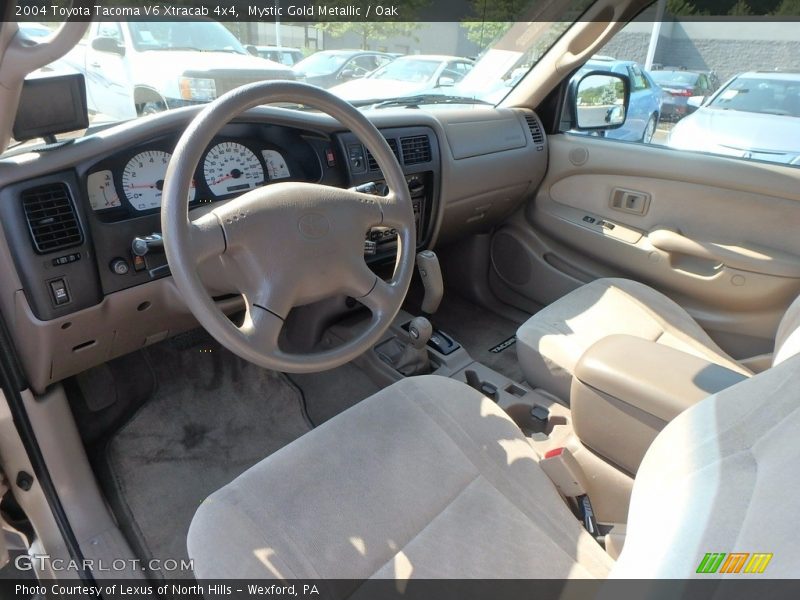 Mystic Gold Metallic / Oak 2004 Toyota Tacoma V6 Xtracab 4x4