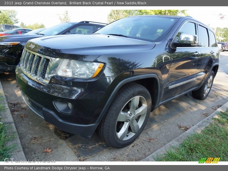 Brilliant Black Crystal Pearl / New Saddle/Black 2013 Jeep Grand Cherokee Overland