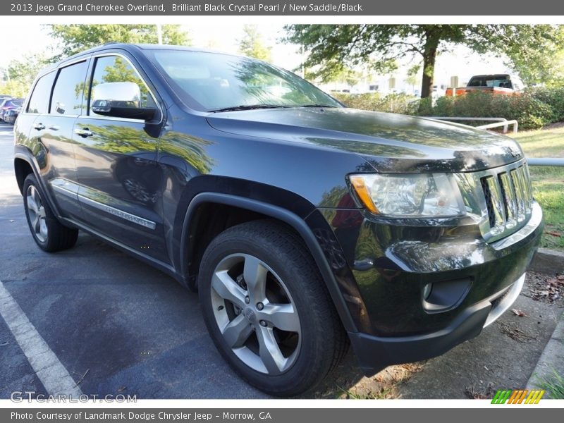 Brilliant Black Crystal Pearl / New Saddle/Black 2013 Jeep Grand Cherokee Overland