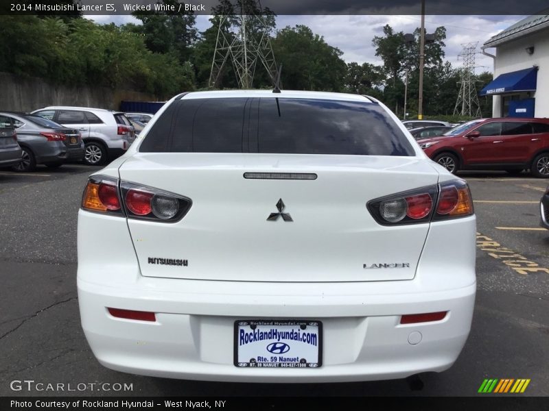 Wicked White / Black 2014 Mitsubishi Lancer ES