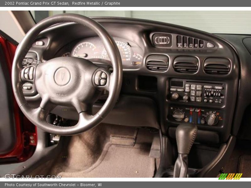 Redfire Metallic / Graphite 2002 Pontiac Grand Prix GT Sedan