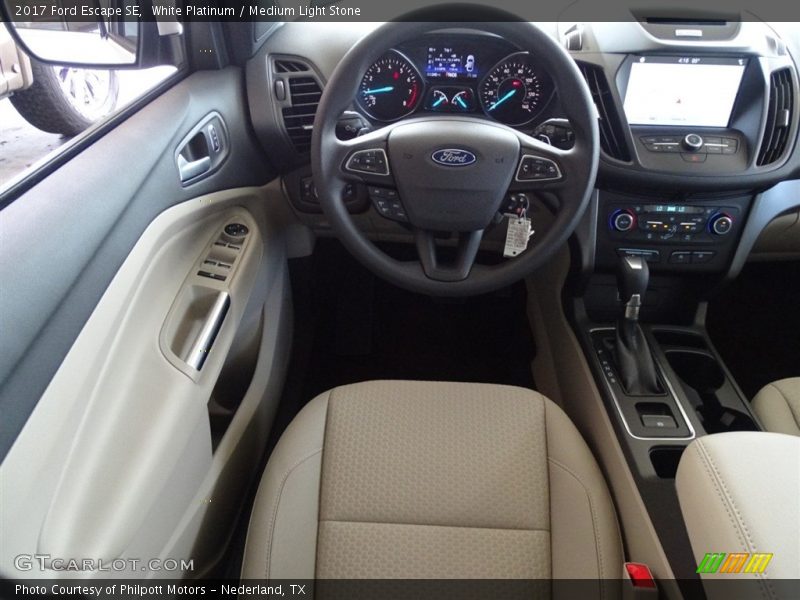 White Platinum / Medium Light Stone 2017 Ford Escape SE