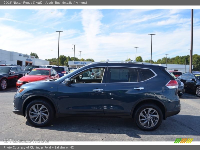 Arctic Blue Metallic / Almond 2016 Nissan Rogue S AWD