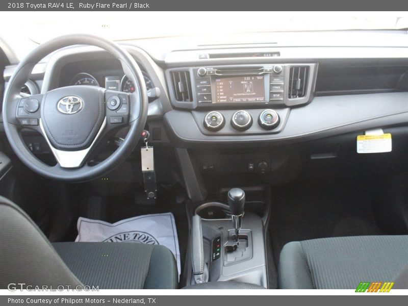 Ruby Flare Pearl / Black 2018 Toyota RAV4 LE