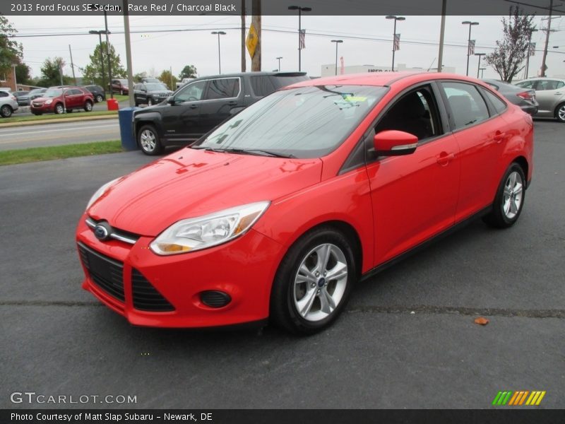 Race Red / Charcoal Black 2013 Ford Focus SE Sedan
