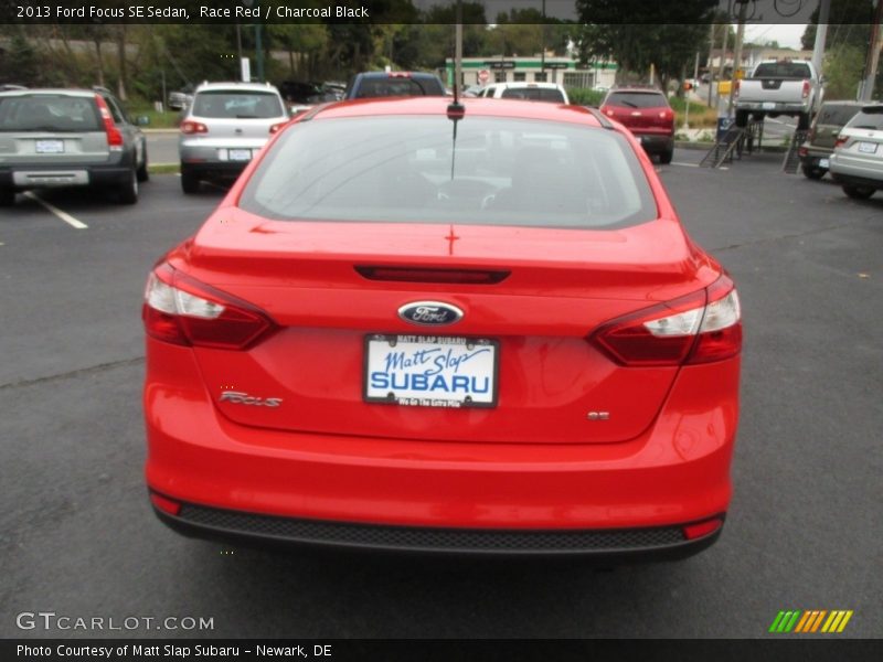 Race Red / Charcoal Black 2013 Ford Focus SE Sedan