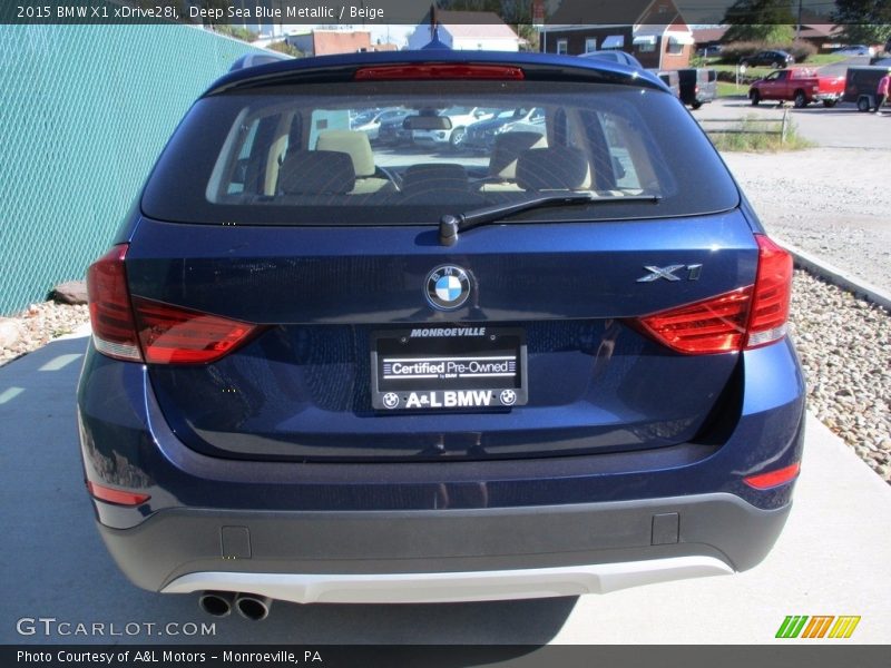 Deep Sea Blue Metallic / Beige 2015 BMW X1 xDrive28i