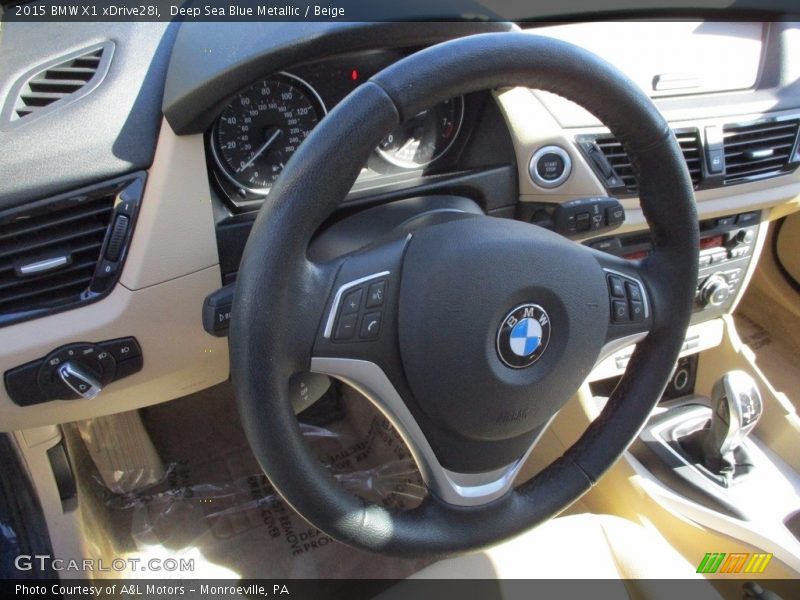 Deep Sea Blue Metallic / Beige 2015 BMW X1 xDrive28i