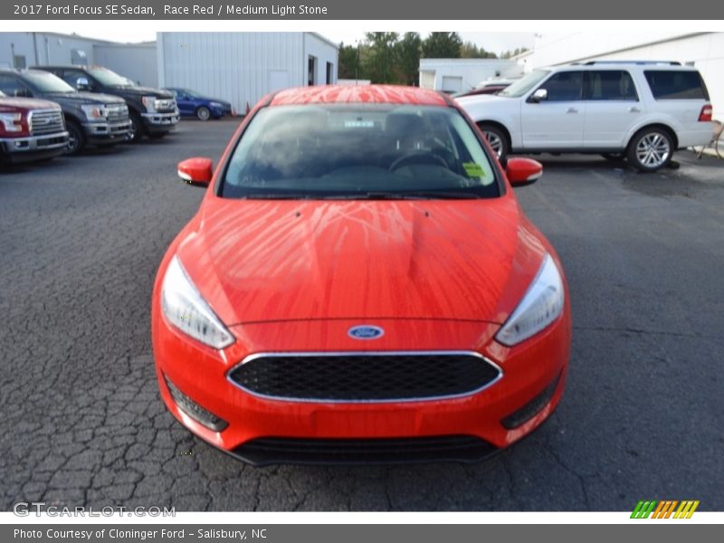 Race Red / Medium Light Stone 2017 Ford Focus SE Sedan