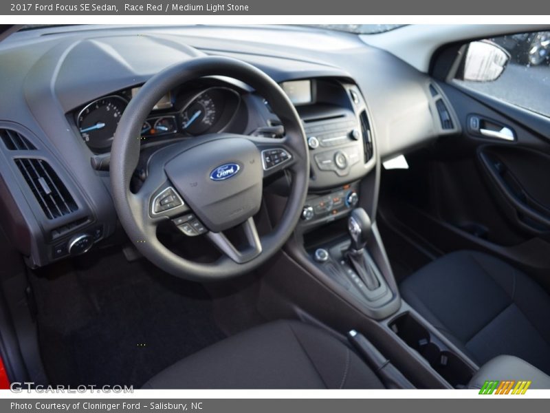 Race Red / Medium Light Stone 2017 Ford Focus SE Sedan